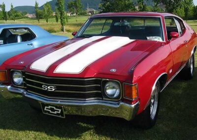 1972 Chevrolet Chevelle SS in red with white racing stripes, showcasing classic car restoration by Wilson Auto Repair.