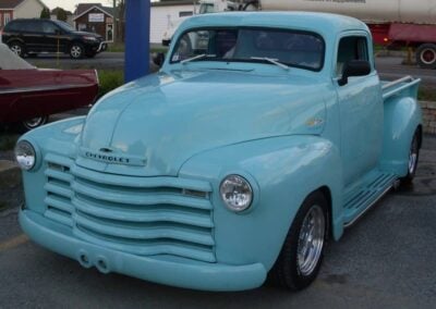 Classic Chevrolet pickup truck in light blue, showcasing Wilson Auto Repair's restoration craftsmanship.